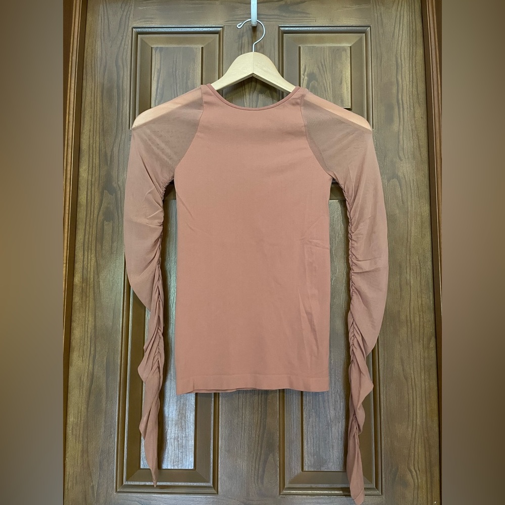 Free People intimately top with sheer mesh sleeves
